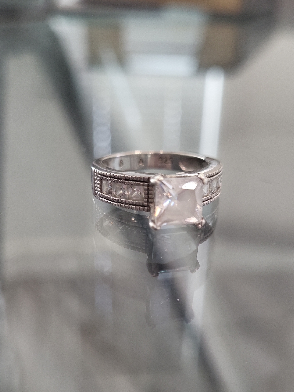 Silver Princess Cut Solitaire Ring with Accent Stones